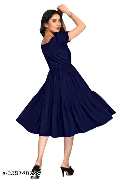 Navy Blue Fashionable Flared Rayon Kurti for Women - Single solid-colored kurti with charming print, perfect for casual events or office wear, available in sizes S to XXL
