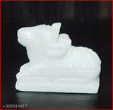 Handcrafted white marble Nandi idol from Sai Collection. Small 5cm statue for home puja, Shivratri or Saawan worship. White marble God Idol on display