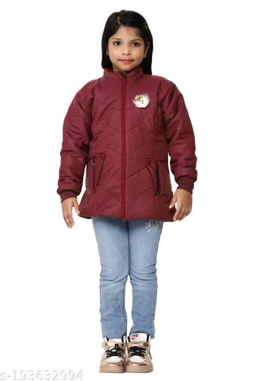 A young girl in a red puffer coat with white boots and a denim skirt