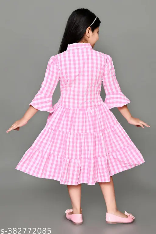 Pink gingham dress with puffed sleeves
