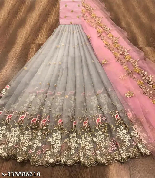 Embroidered net lehenga choli with dupatta, free size, heavy dupion silk blouse and net dupatta, multi-thread work, semi stitch and cut work border, best quality Indian product