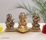 Gold-plated Indian Laxmi Ganesh Saraswati statue with oil lamp, ideal for home decor and pooja articles
