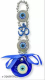 Blue plastic Feng Shui om evil eye wall hanging for good luck, 18.5cm length