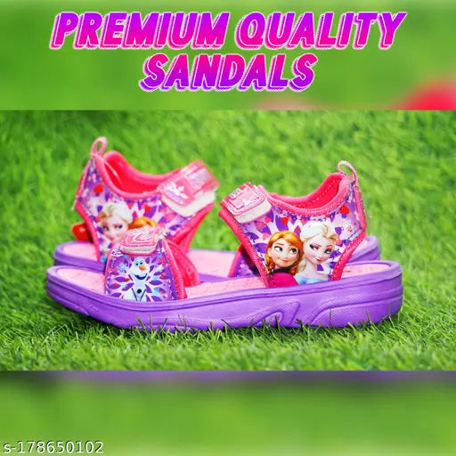 Purple and pink sandals with designs inspired by Disney's Frozen characters, Elsa and Anna