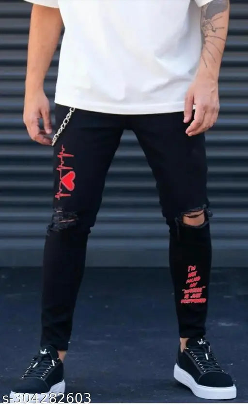 Red print jeans: Cotton placement print in two sizes - 28" waist, 30" waist (India origin)