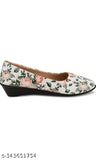 White synthetic slip-on ballerinas from imporio Fashion Hub, featuring printed design and patent leather. Attractive and comfortable for women, available in various sizes (IND-3 to IND-8). Made in India