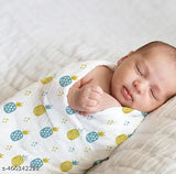White muslin swaddle with pineapple print, organic cotton for newborn baby.