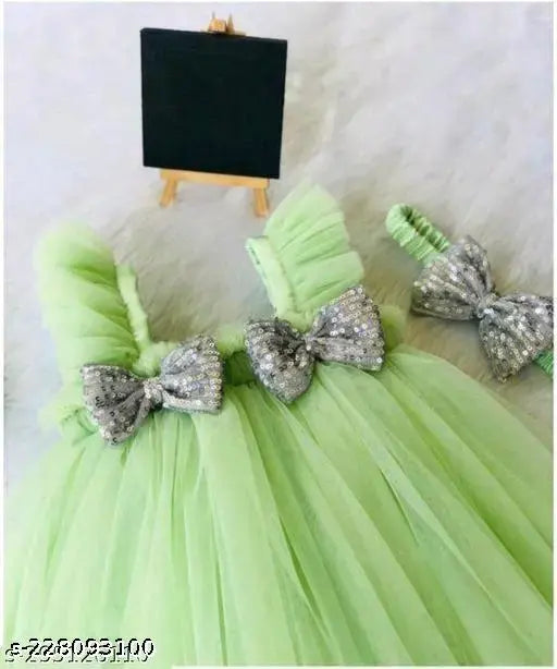 Aqua tulle baby dress with ruffle collar and bow embellishments