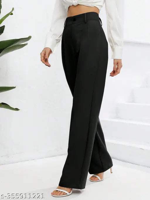 Black wide-leg trousers, high-waisted, long-sleeve top