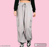 Grey cargo pants with side pockets and tie waistband