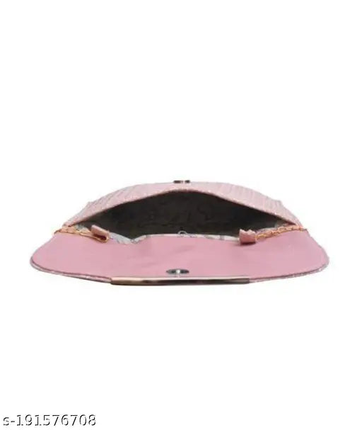 Pink leather slingbag, with black trim and zipper