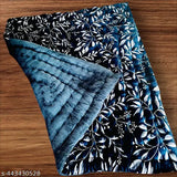 Blue quilt with intricate floral design