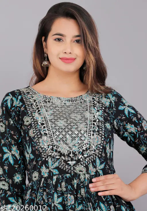 Rayon flared print kurti with three-quarter sleeves, ideal for casual wear by VASHINEH. Handcrafted, Indian-origin Floral design, perfect for fashion-forward women