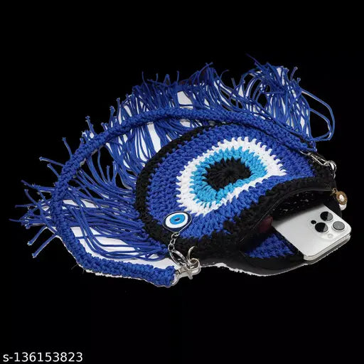 Evil eye blue and black knitted sling bag