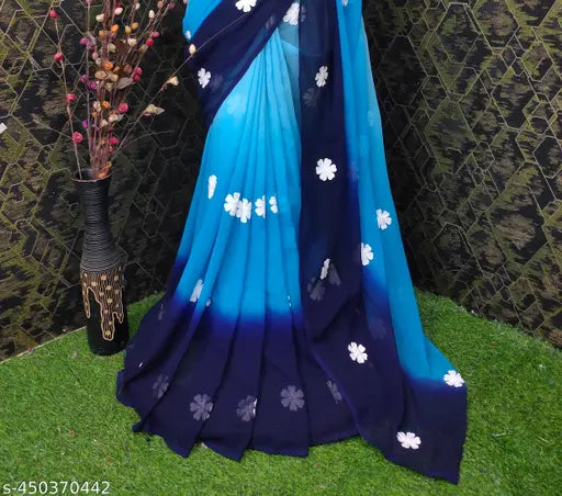 Women's trendy georgette saree with embroidery designs, long skirt and pallu, fashionable for parties and events