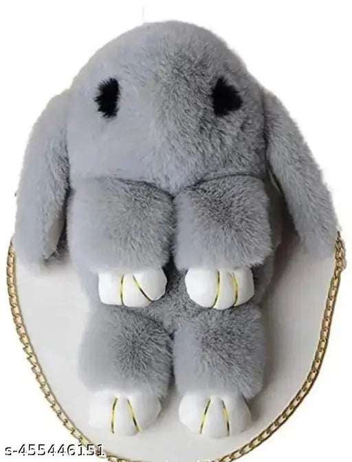 Grey stuffed animal in the shape of a bunny