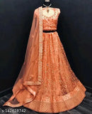 Orange embroidered lehenga choli set with heavy net fabric, free size, semi-stitched or unstitched, including one lehenga, dupatta, and blouse. Ruffled lehenga and embellished blouse, 2.5m lehenga flair, waist-40", height-43". Made in India