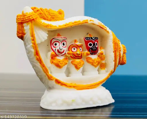 Handcrafted marble Jagannath Dham idol set, featuring Lord Jagannath, Balabhadra, and Devi Subhadra. Perfect for car dashboards, home decor, or puja rooms. Made in India, 7 cm length, 5 cm height, and 1 cm breadth