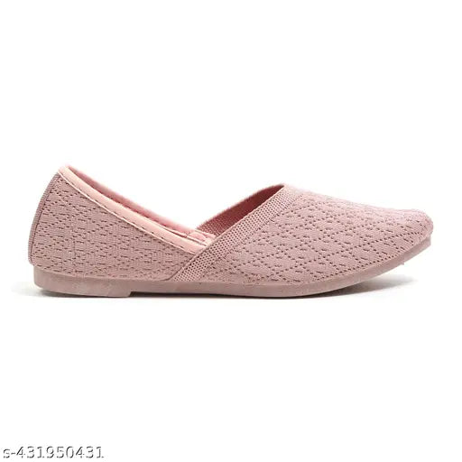 Women's pink textured slip-on shoes with a casual chic style, perfect for party wear