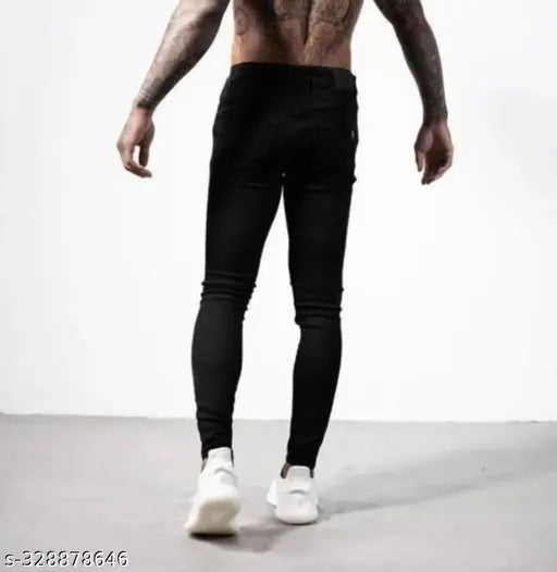 Black denim knee-cut jeans for men by KODO JEANS. Solid and placement print design, high-quality manufacturing, 5-star rated brand from Gillkart." (114 characters)