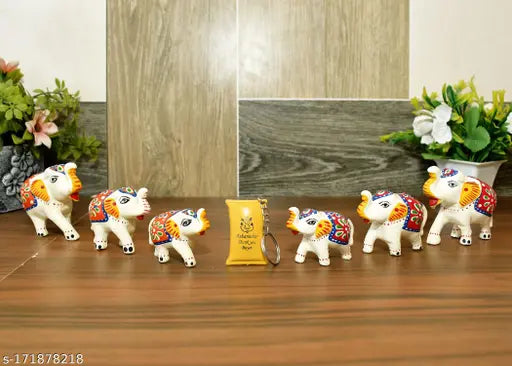 White, red, orange Paper Mache elephant figurines set for home decor