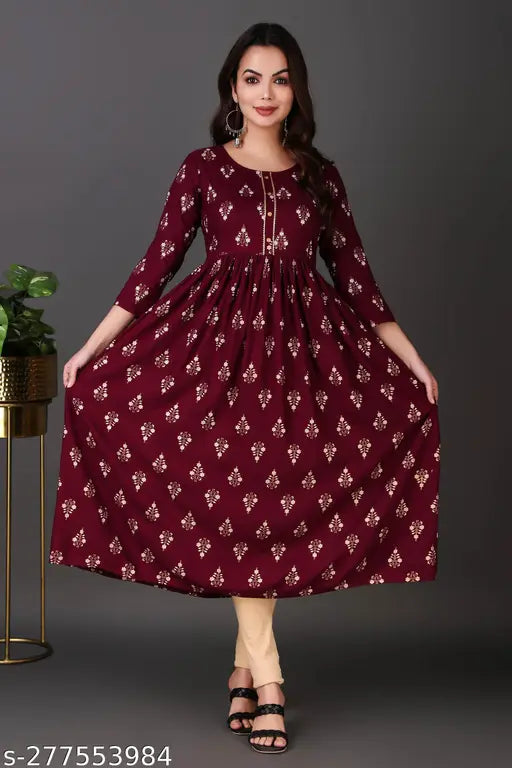 Soft rayon long kurti for pregnant women, featuring three-quarter sleeves and printed combo design. India origin