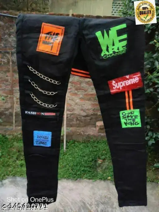 Men's black denim jeans with placement print, size 26waist x 38length (Indian origin)