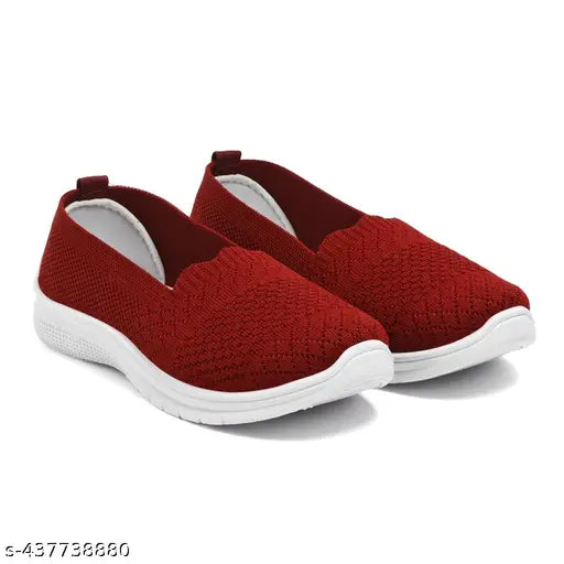 Red shoe with a zip closure on the side