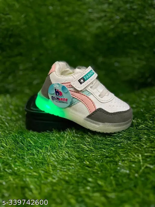 Pink and black sneaker with glow-in-dark design