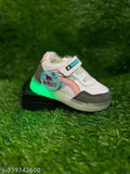 Pink and black sneaker with glow-in-dark design
