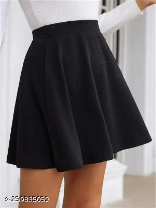 Black pleated skirt, knee length, fitted waist