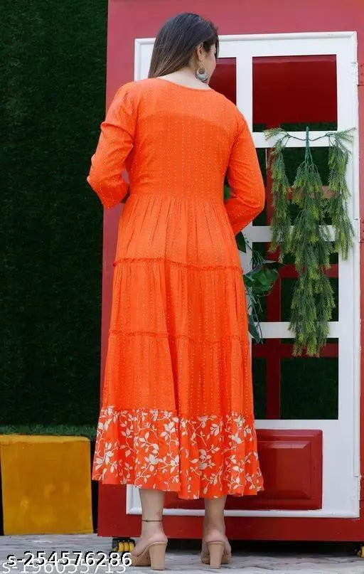 Rayon Anarkali Kurta dress with sequence embroidery, printed combo, three-quarter sleeves on woman model