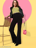 Fashionable women's trousers in black with wide-leg design, paired with strappy sandals and pink purse