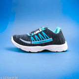 Teal and white running shoes, black laces