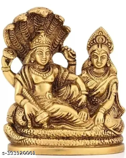 Brass metal Lakshmi Vishnu Ji Idol, intricate detail of Goddess Lakshmi and Lord Narayan (Vishnu) on altar, traditional Indian deity statue for puja and prayer spaces