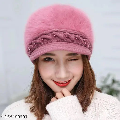 Fashionable winter wool beanie cap. Soft pink fur lining inside. Visor style design for women's fashion