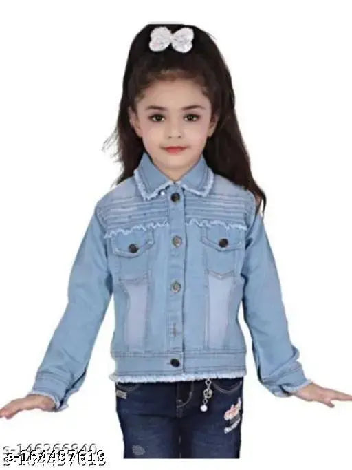 Girl in denim jacket, smiling at camera