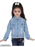 Girl in denim jacket, smiling at camera