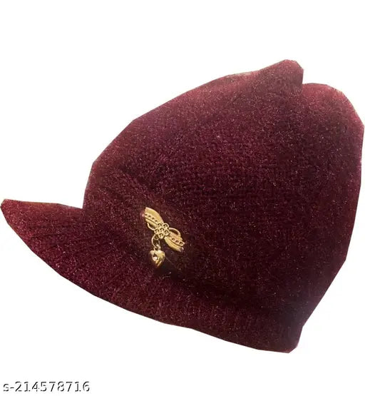 A maroon wool winter hat, with a yellow emblem on the left side, displayed against a white background