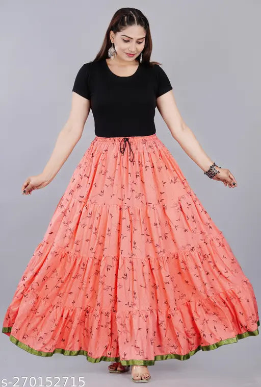 A woman in a long printed skirt