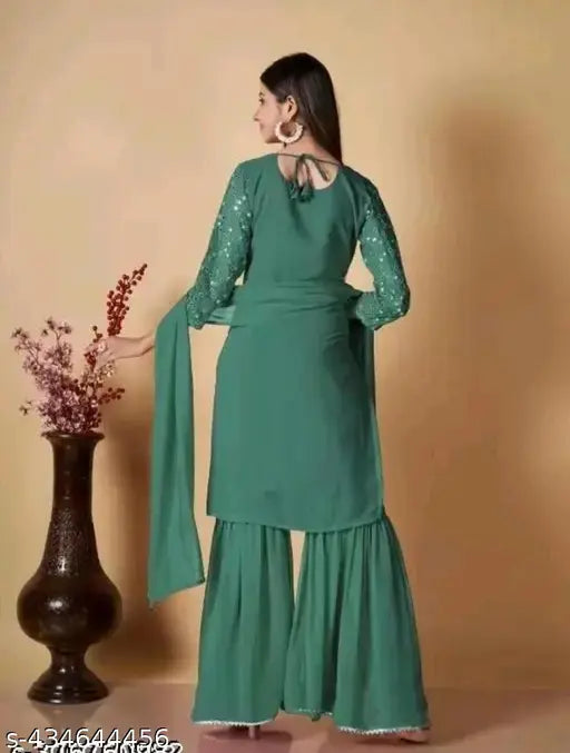Teal satin women's kurta set with ruffle bottoms and matching dupatta