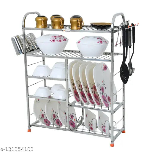 A stainless steel five shelf wall mount kitchen rack, holding various dishes, utensils, and a plate