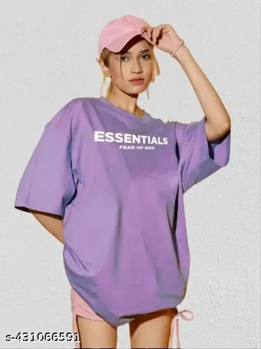 Purple oversized t-shirt with Essentials on front, side pockets