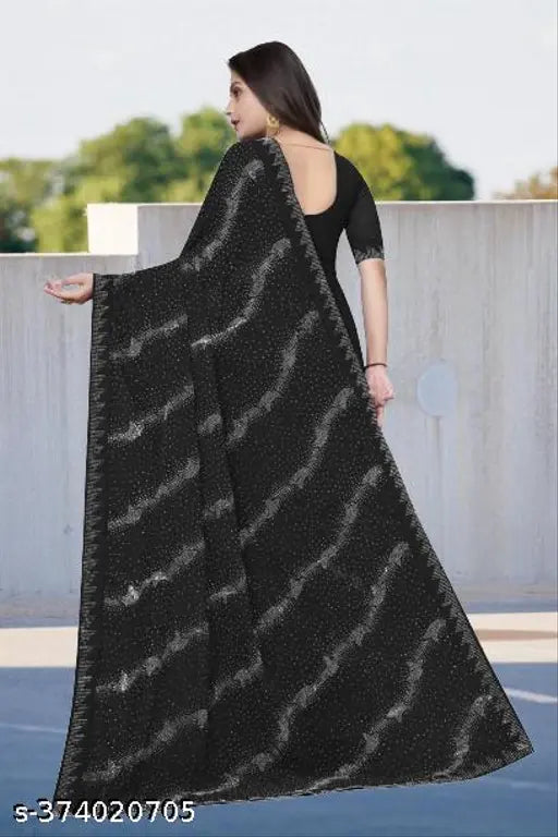 Long, pure georgette silk saree with contrast blouse. Heavy diamond work on border