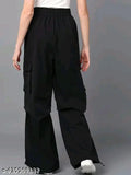 Black jumpsuit with ruched detailing and long sleeves