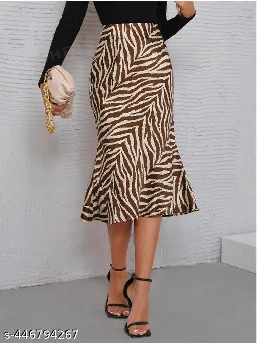 Printed polyester pencil bodycone skirt, floral print, midi length, high low ruffle hem. Ideal for spring/autumn events like dating or weekends. Made in India" (94 characters)