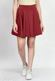 Polyester solid-color skater skirt with attached inner shorts, perfect for everyday wear and trendy outfits. Comes in sizes 26, 28, 30, 32, from Klart, India