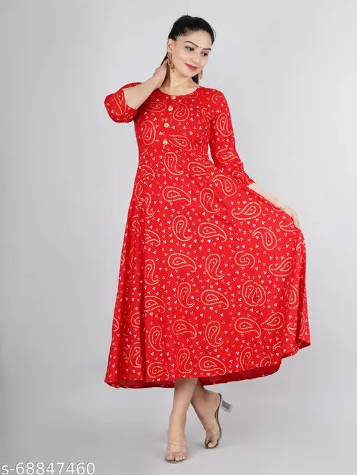 Gold print rayon Anarkali kurti with three-quarter sleeves, Indian fashion on mannequin