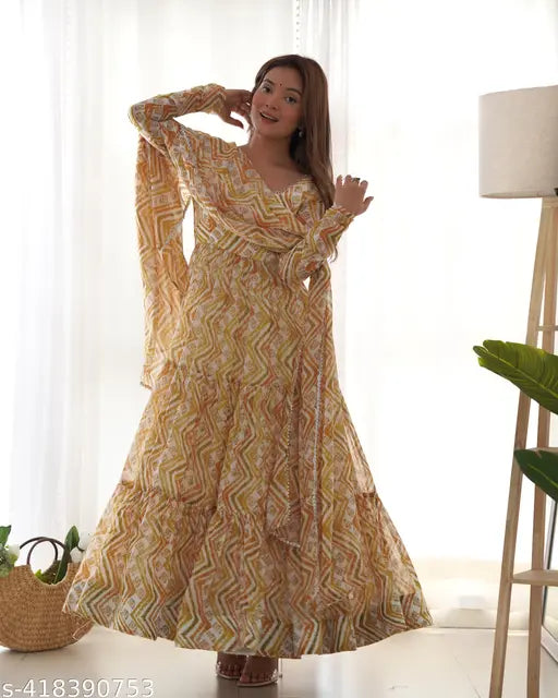 Yellow heavy pure soft fox georgette Anarkali kurta set with long sleeves, printed net pattern, and flair gown, paired with a 28-inch shawl-style dupatta featuring lace work. Indian wedding outfit for Haldi ceremony