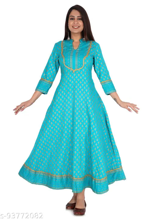 Light blue, long kurta dress with embroidered details and gold borders